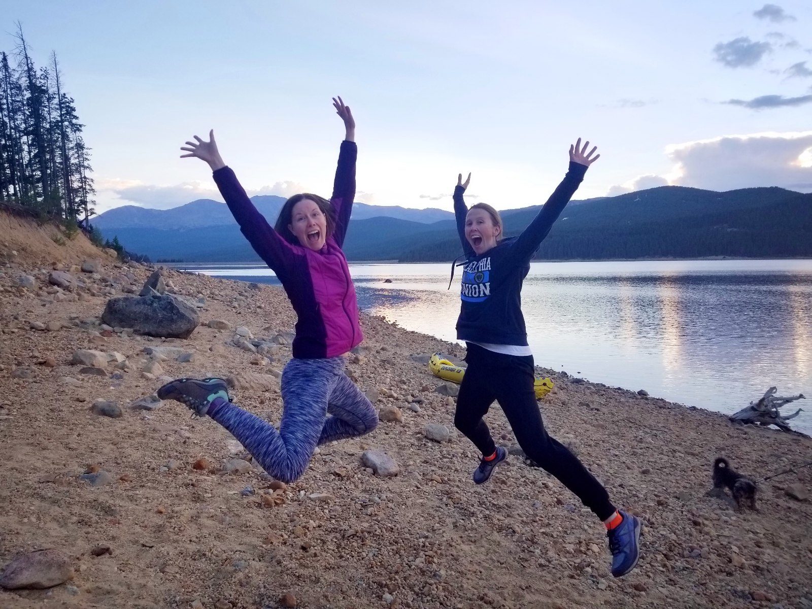 Jumping for joy at chilly Turquoise Lake at sunset