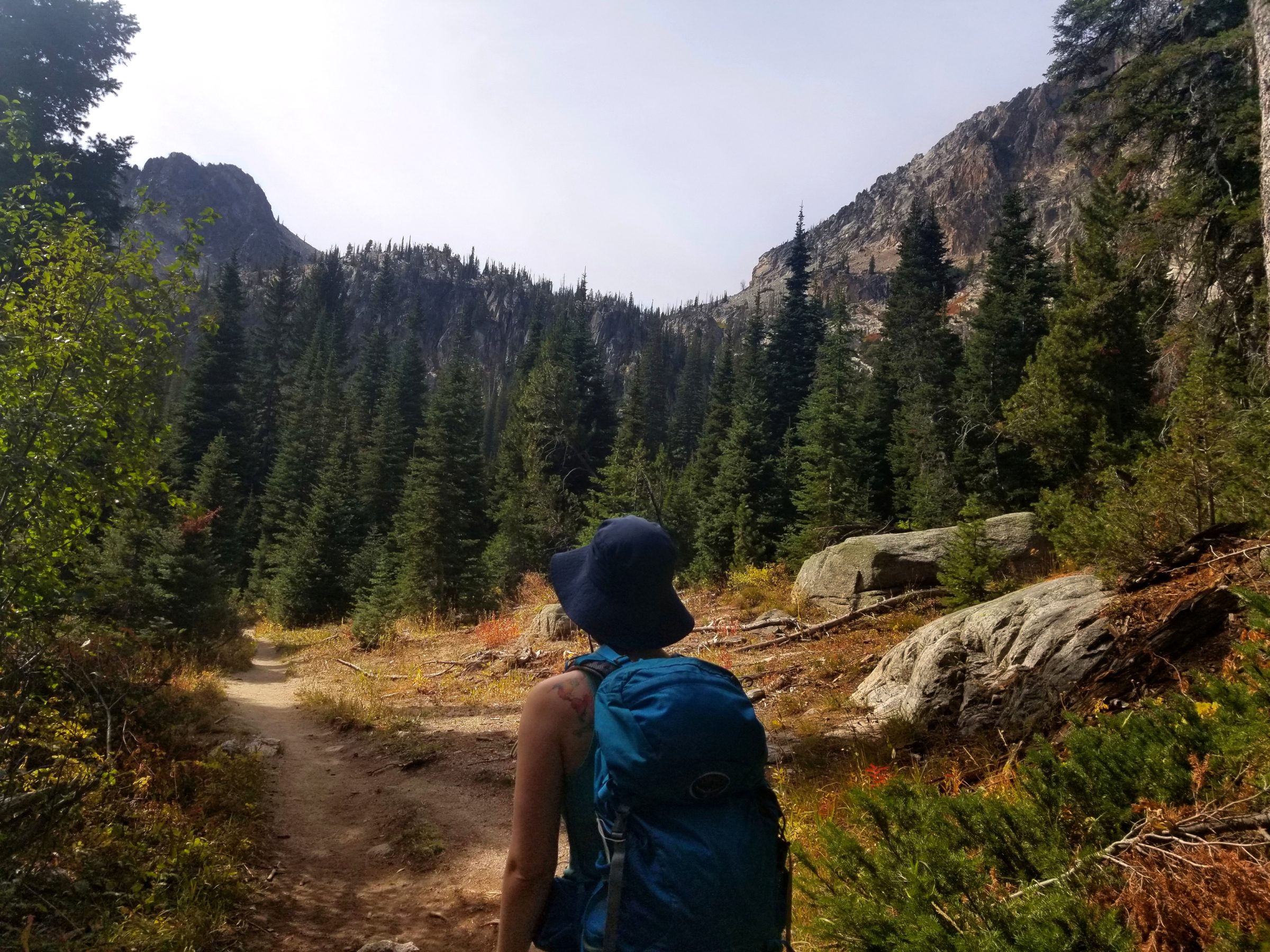 Sarah hiking through Fall colors in the Sawtooth Mountains