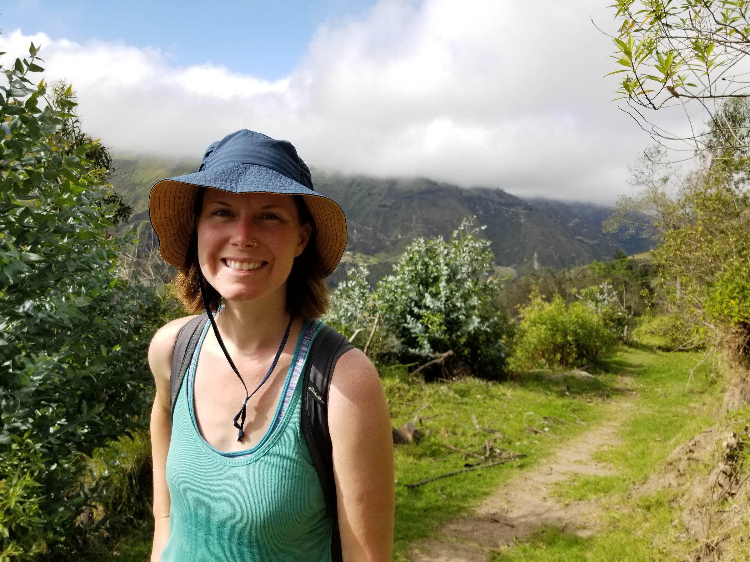 Sarah is all smiles hiking on Day 1